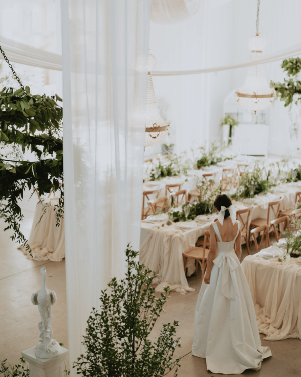 wedding reception venue decorated in pale colours